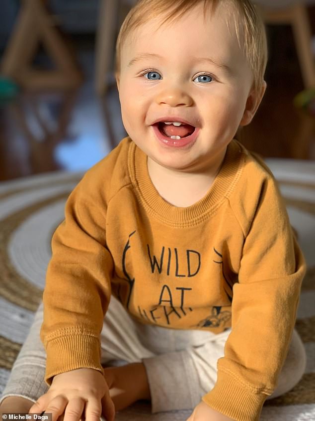 Michelle Daga, her partner Jahmin, both 32, and baby Jahlee (pictured), 1, live in an apartment without a backyard, and they are three of thousands who are subject to the strictest restrictions Australia has ever seen