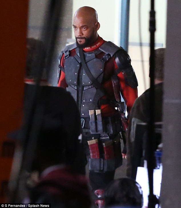 Back in action: Suicide Squad also stars Will Smith, who starred with Robbie in the film Focus. He was also seen shooting scenes on location in Toronto on Sunday as supervillain Deadshot