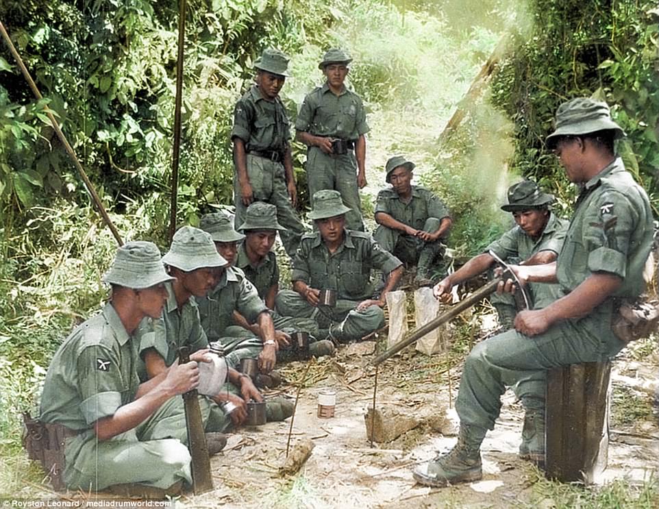 A group of soldiers trek through the rivers of Malaysia. Anti-war protesters in Britain were dealt with harshly during the strikes, with many being arrested and deported. This resulted in demonstrators becoming more and more militant