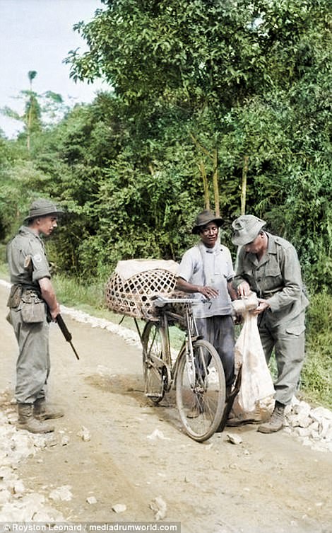 A group of soldiers trek through the rivers of Malaysia. Anti-war protesters in Britain were dealt with harshly during the strikes, with many being arrested and deported. This resulted in demonstrators becoming more and more militant
