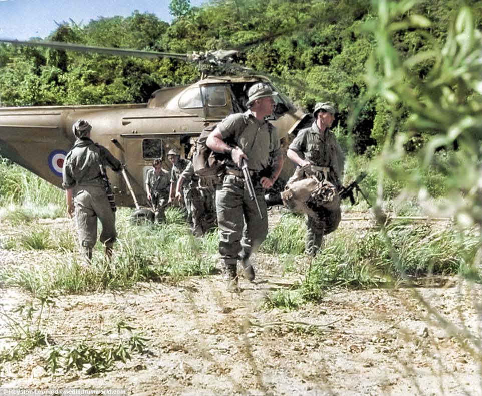 British soldiers land in Malaysia having been dropped off by a helicopter. Amazingly, the battle was never branded a war due to insurance purposes. The prevalent rubber plantations and tin-mining industries had pushed for the use of the term