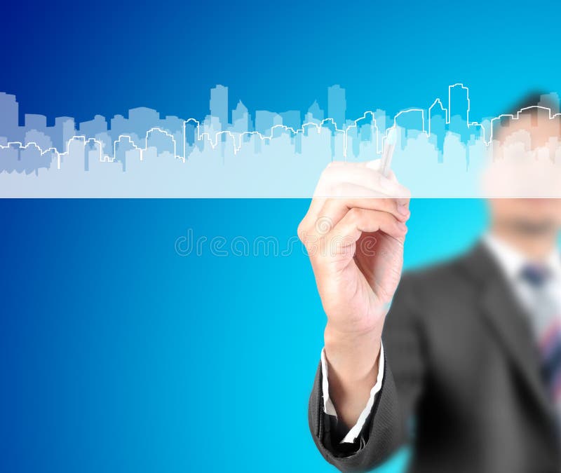 Business man drawing city. With blue background royalty free stock photos