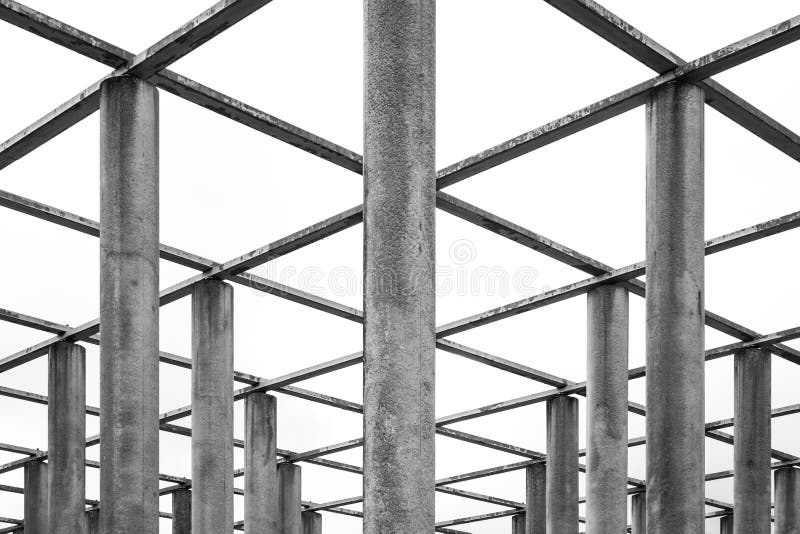 Cement Columns Chair Rough Texture Perspective Overhead Grid Geo. Metric Pattern Design Outdoor Park Public Upright Minimal Bright stock image Cement Columns Chair Rough Texture Perspective Overhead Grid Geo. Metric Pattern Design Outdoor Park Public Upright Minimal Bright stock image