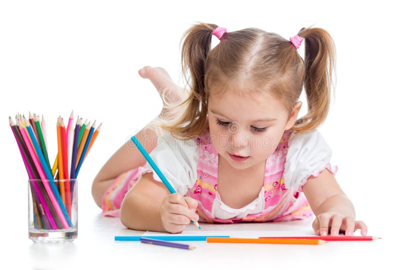 Child drawing with pencils. Cute child drawing with colorful pencils stock image