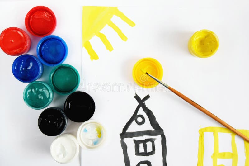 childrens drawing with paints. colored gouache with a brush and pattern. close up. stock images childrens drawing with paints. colored gouache with a brush and pattern. close up. stock images
