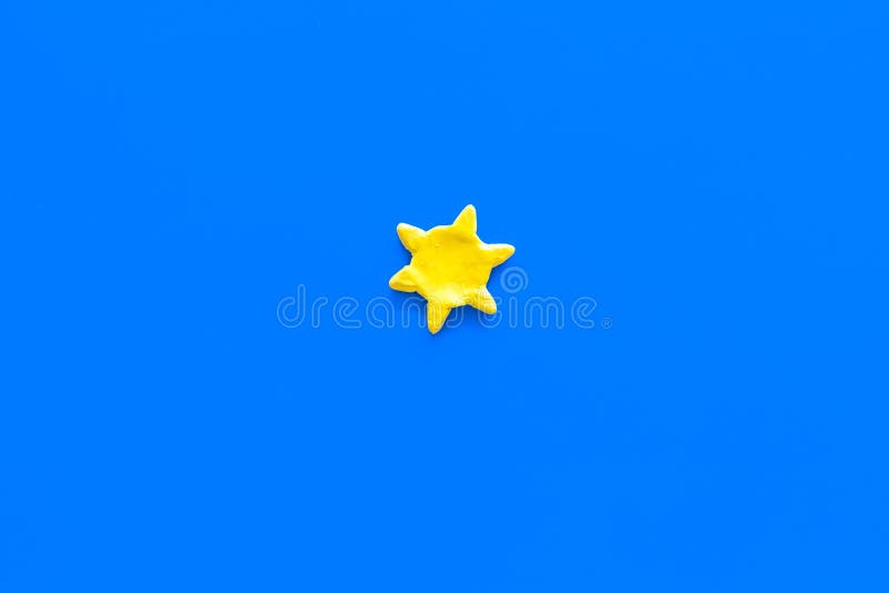 Clear weather concept. Sunny. Sun on blue background top view copy space. Clear weather concept. Sunny. Sun on blue background top view copy space royalty free stock images