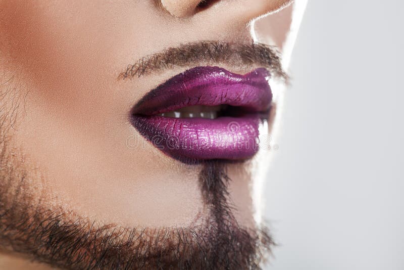 Closeup photo of bearded male lips with makeup. Macro. horizontal royalty free stock images