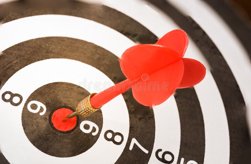 Dart board with darts arrow in the target center. stock photos