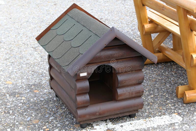 Dog house. New dog house made from log wood royalty free stock image Dog house. New dog house made from log wood royalty free stock image