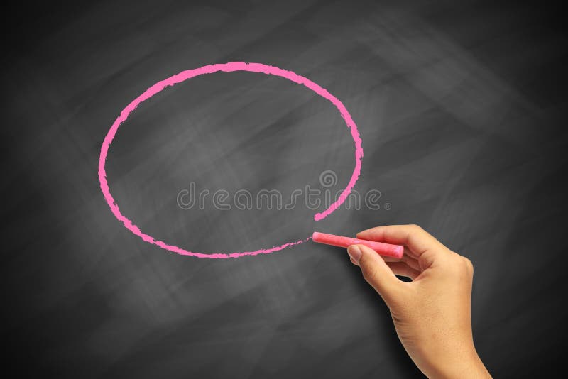 Drawing circle on blackboard stock images