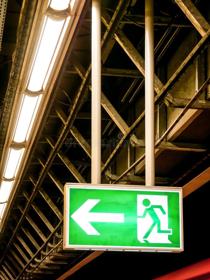 Emergency exit sign. Modern emergency exit sign - photo royalty free stock images Emergency exit sign. Modern emergency exit sign - photo royalty free stock images