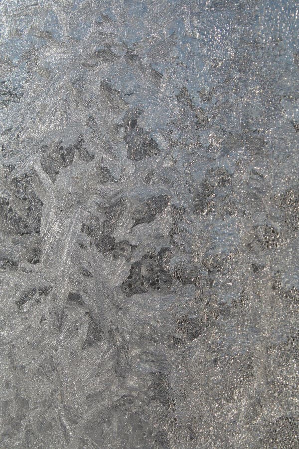 Frost drawing of on glass. The winter holidays royalty free stock photos