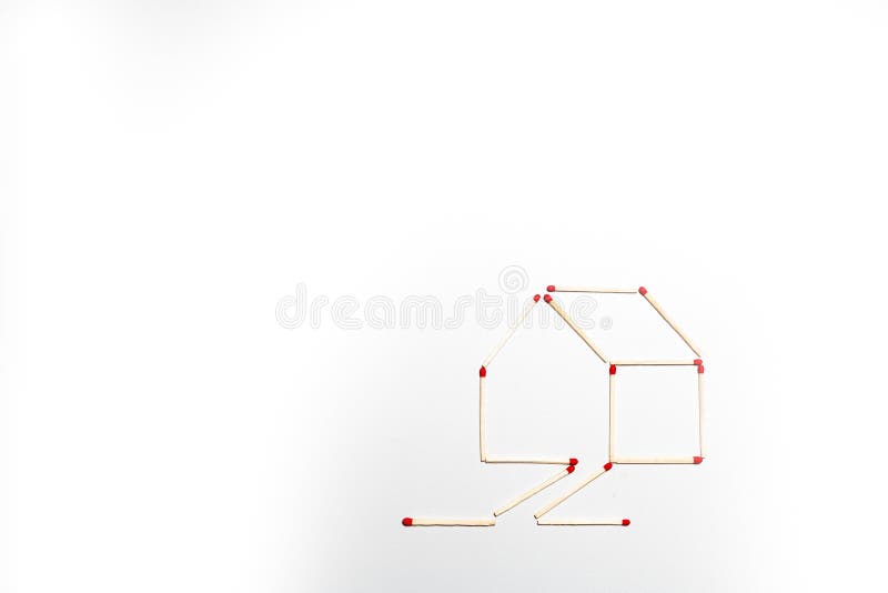 House made of matchsticks on an isolated white background. With room for text alongside royalty free stock image