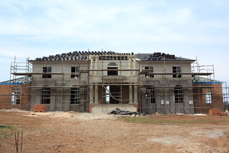 Manor house construction. Building process of a modern manor house in the final stages (in Australia) royalty free stock image Manor house construction. Building process of a modern manor house in the final stages (in Australia) royalty free stock image