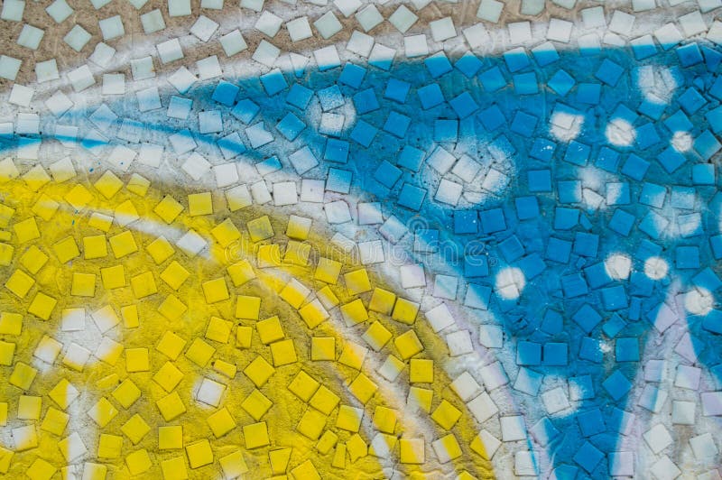 Multi-colored fantasy pattern on the wall of the mosaic, the background of children`s drawing stock image