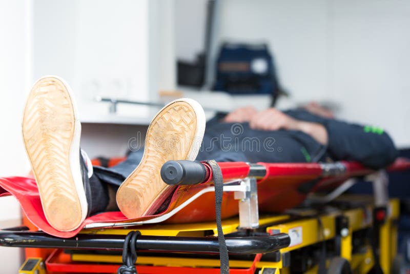 Patient in emergency car ambulance. Medical chart royalty free stock image Patient in emergency car ambulance. Medical chart royalty free stock image