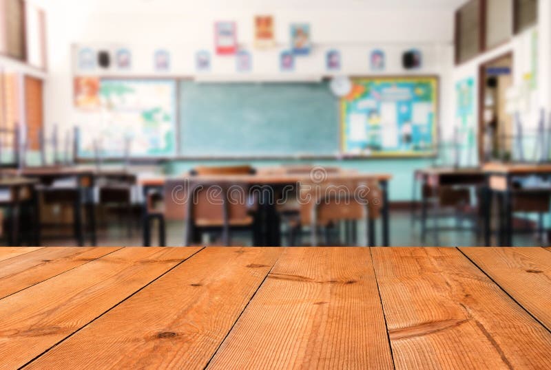 Perspective wooden plate for background. Perspective wooden plate over blur classroom for background stock photography Perspective wooden plate for background. Perspective wooden plate over blur classroom for background stock photography