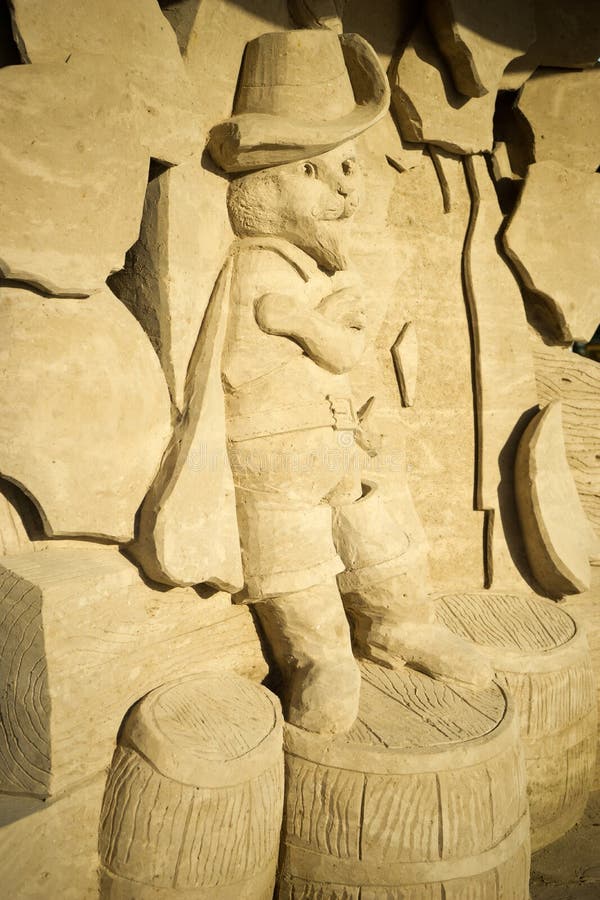 A sand sculpture of Puss in Boots stock photography