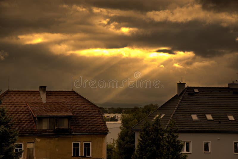 Sun rays shining through the clouds stock image Sun rays shining through the clouds stock image