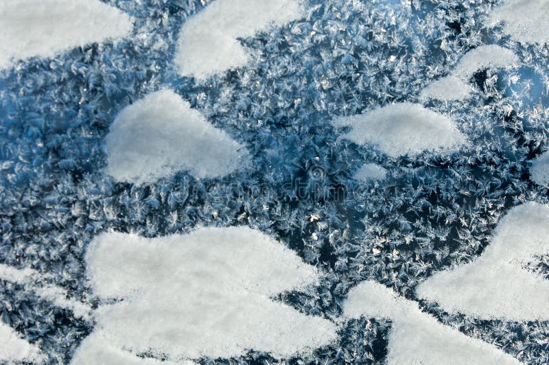 Texture, pattern. Winter photography. Picture of frost on the glass. Frozen water on the glass. a fantastic drawing, you will be. Right to use it in your design stock images