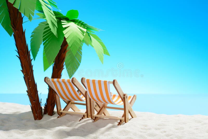 Two sun loungers under a palm tree on the sandy coast. Sky with copy space. F stock photo Two sun loungers under a palm tree on the sandy coast. Sky with copy space. F stock photo