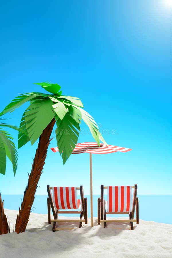 Two sun loungers under a palm tree on the sandy coast. Sky with copy space. F royalty free stock photo