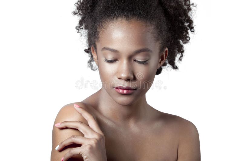 Young beautiful mulatto girl with clean perfect skin close-up stock images
