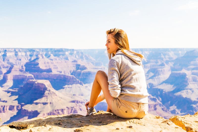 Young beautiful woman traveling, Grand Canyon, USA stock photography