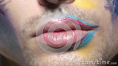 Male lips macro. Mouth slightly smiling makeup stock footage