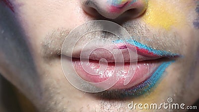 Smile of man macro. Male lips artistic makeup stock video footage